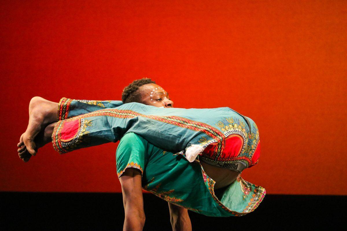 The ZuZu African Acrobats performing thrilling stunts for a captivated audience at The University of Tennessee on Feb. 22, 2021.