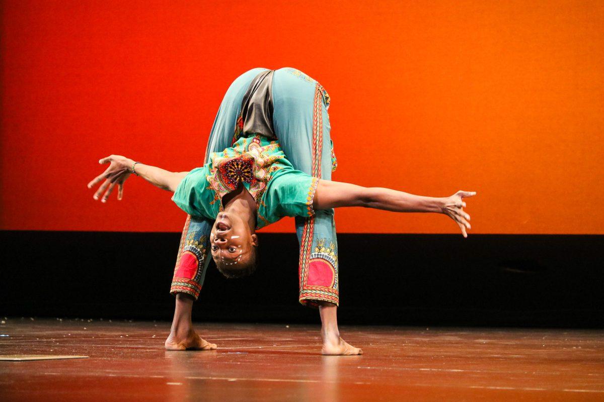 The ZuZu African Acrobats performing thrilling stunts for a captivated audience at The University of Tennessee on Feb. 22, 2021.