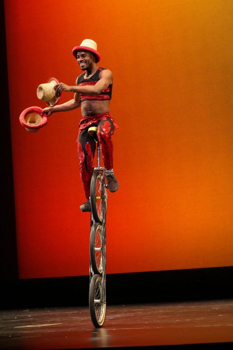 The ZuZu African Acrobats performing thrilling stunts for a captivated audience at The University of Tennessee on Feb. 22, 2021.