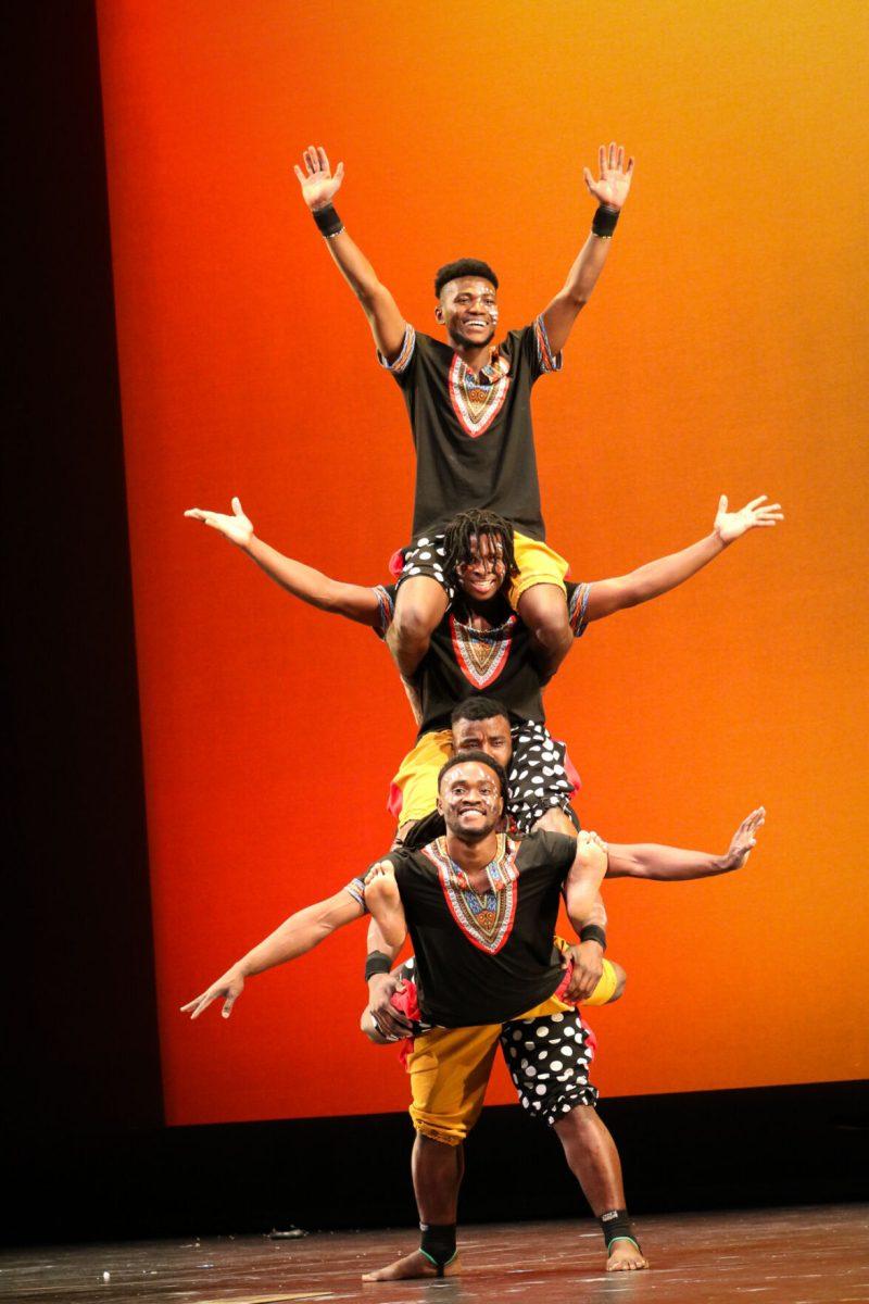 The ZuZu African Acrobats performing thrilling stunts for a captivated audience at The University of Tennessee on Feb. 22, 2021.