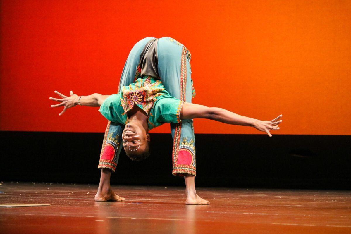 The ZuZu African Acrobats performing thrilling stunts for a captivated audience at The University of Tennessee on Feb. 22, 2021.