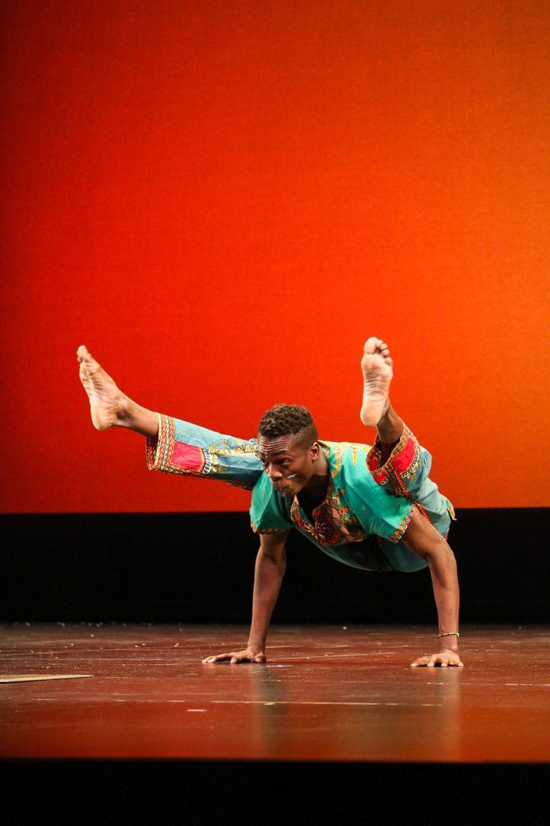 The ZuZu African Acrobats performing thrilling stunts for a captivated audience at The University of Tennessee on Feb. 22, 2021.