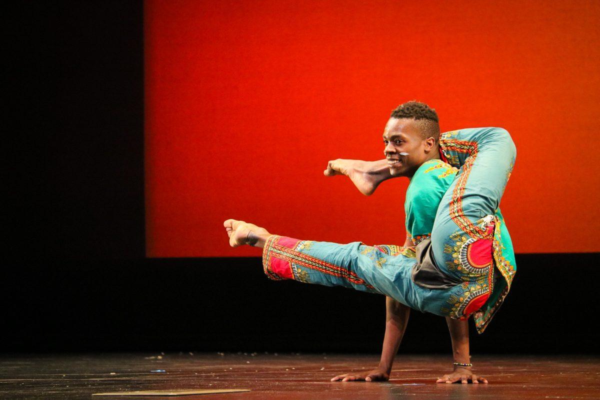 The ZuZu African Acrobats performing thrilling stunts for a captivated audience at The University of Tennessee on Feb. 22, 2021.