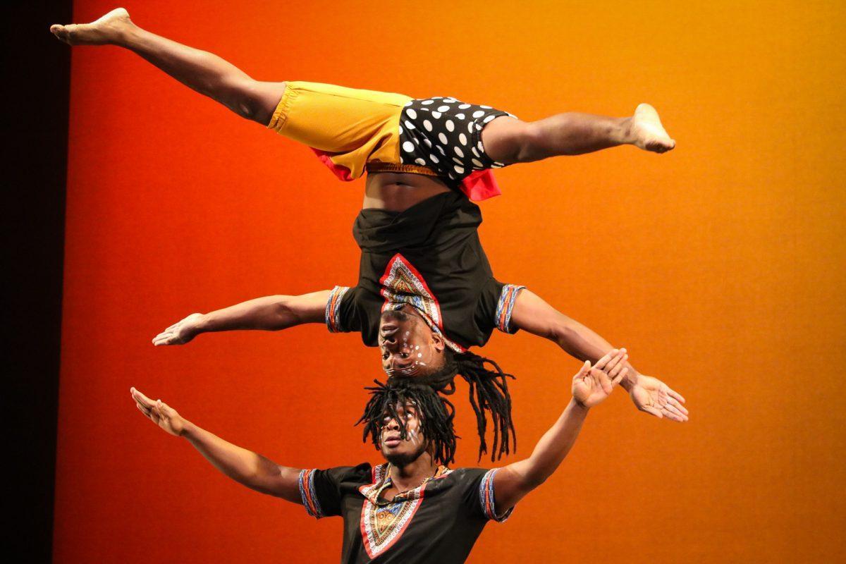 The ZuZu African Acrobats performing thrilling stunts for a captivated audience at The University of Tennessee on Feb. 22, 2021.