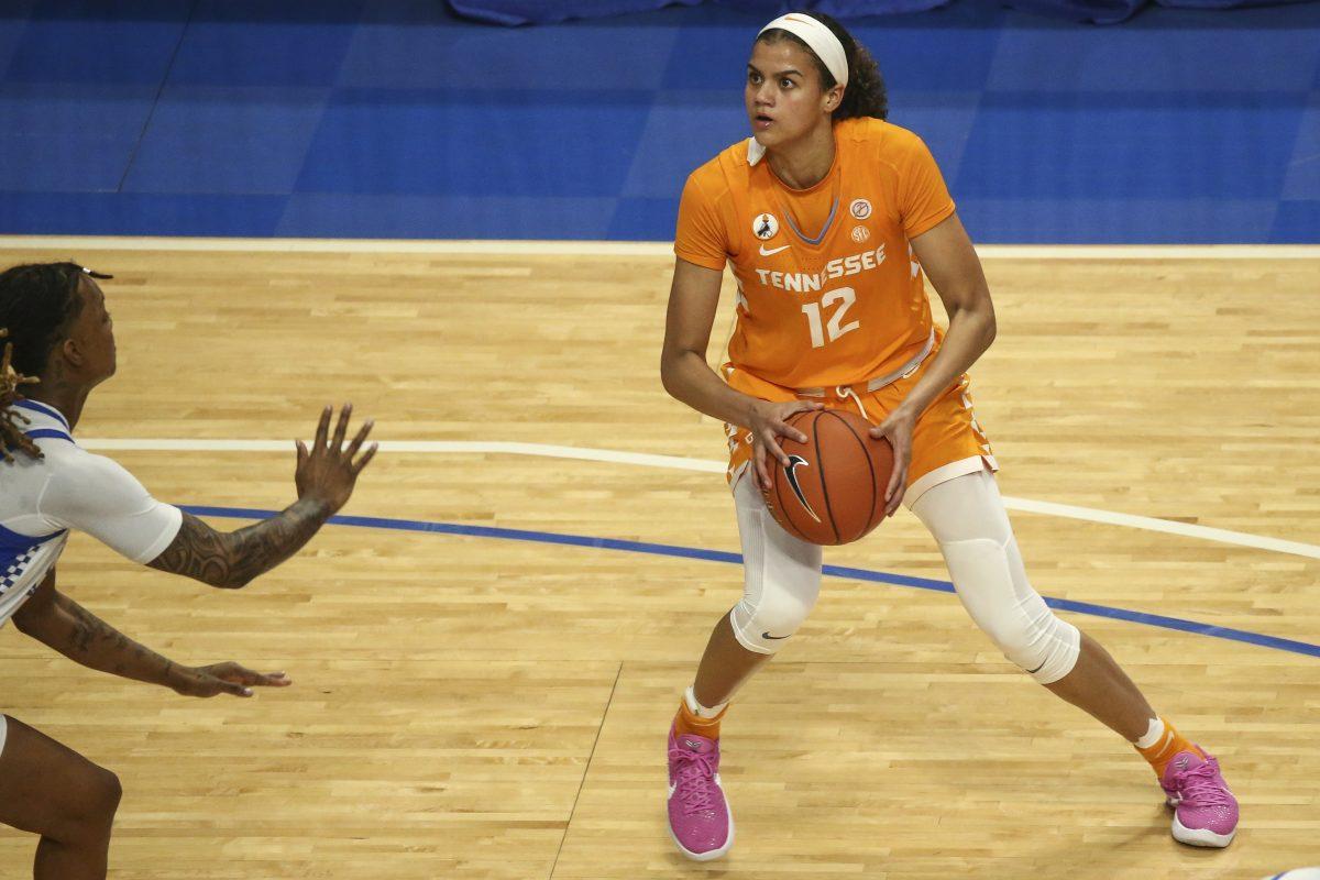 Tennessee's Rae Burrell (12) goes to shoot against Kentucky. Photo by Grace Bradley | UK Athletics