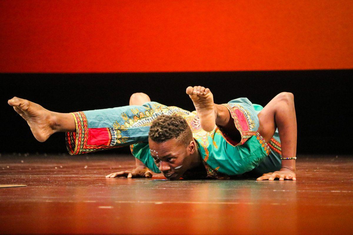 The ZuZu African Acrobats performing thrilling stunts for a captivated audience at The University of Tennessee on Feb. 22, 2021.