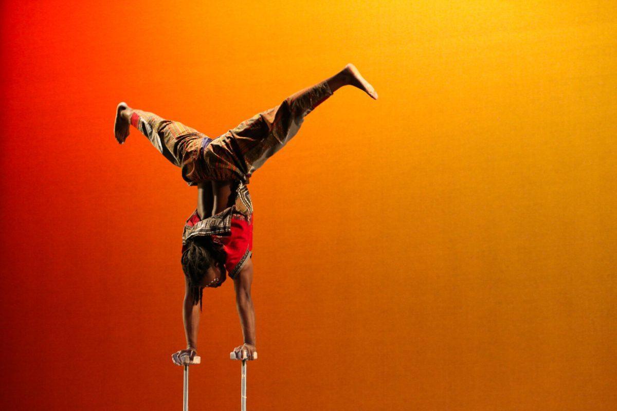 The ZuZu African Acrobats performing thrilling stunts for a captivated audience at The University of Tennessee on Feb. 22, 2021.