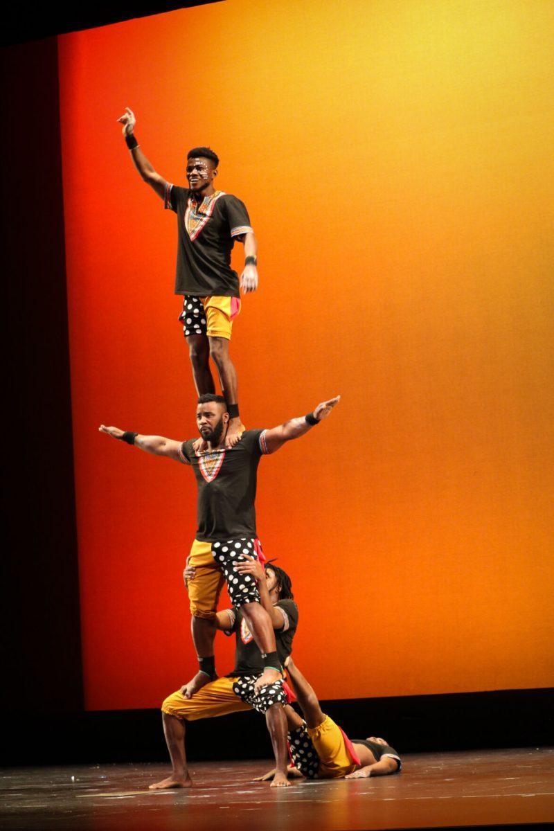 The ZuZu African Acrobats performing thrilling stunts for a captivated audience at The University of Tennessee on Feb. 22, 2021.