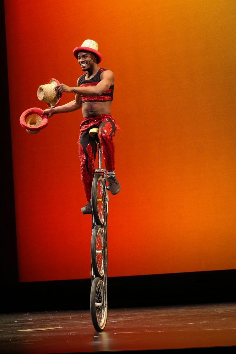 The ZuZu African Acrobats performing thrilling stunts for a captivated audience at The University of Tennessee on Feb. 22, 2021.