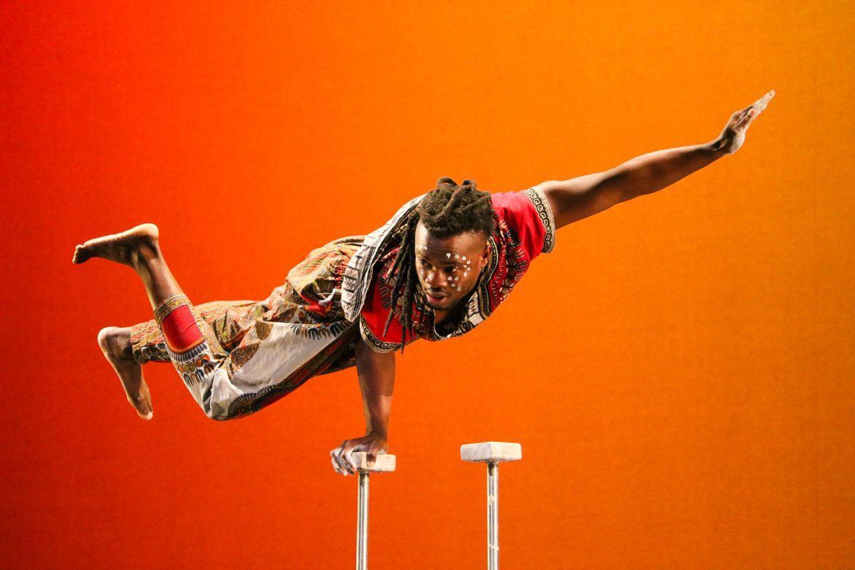 The ZuZu African Acrobats performing thrilling stunts for a captivated audience at The University of Tennessee on Feb. 22, 2021.