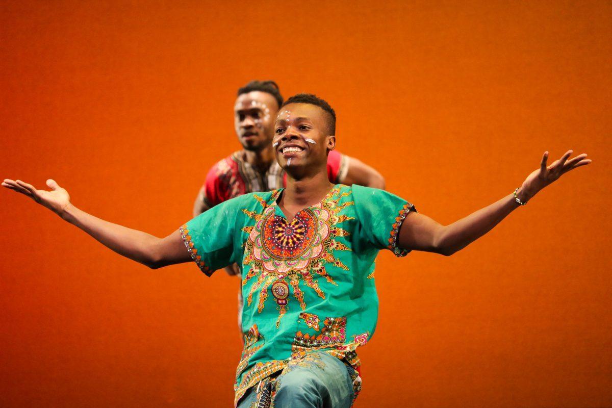 The ZuZu African Acrobats performing thrilling stunts for a captivated audience at The University of Tennessee on Feb. 22, 2021.