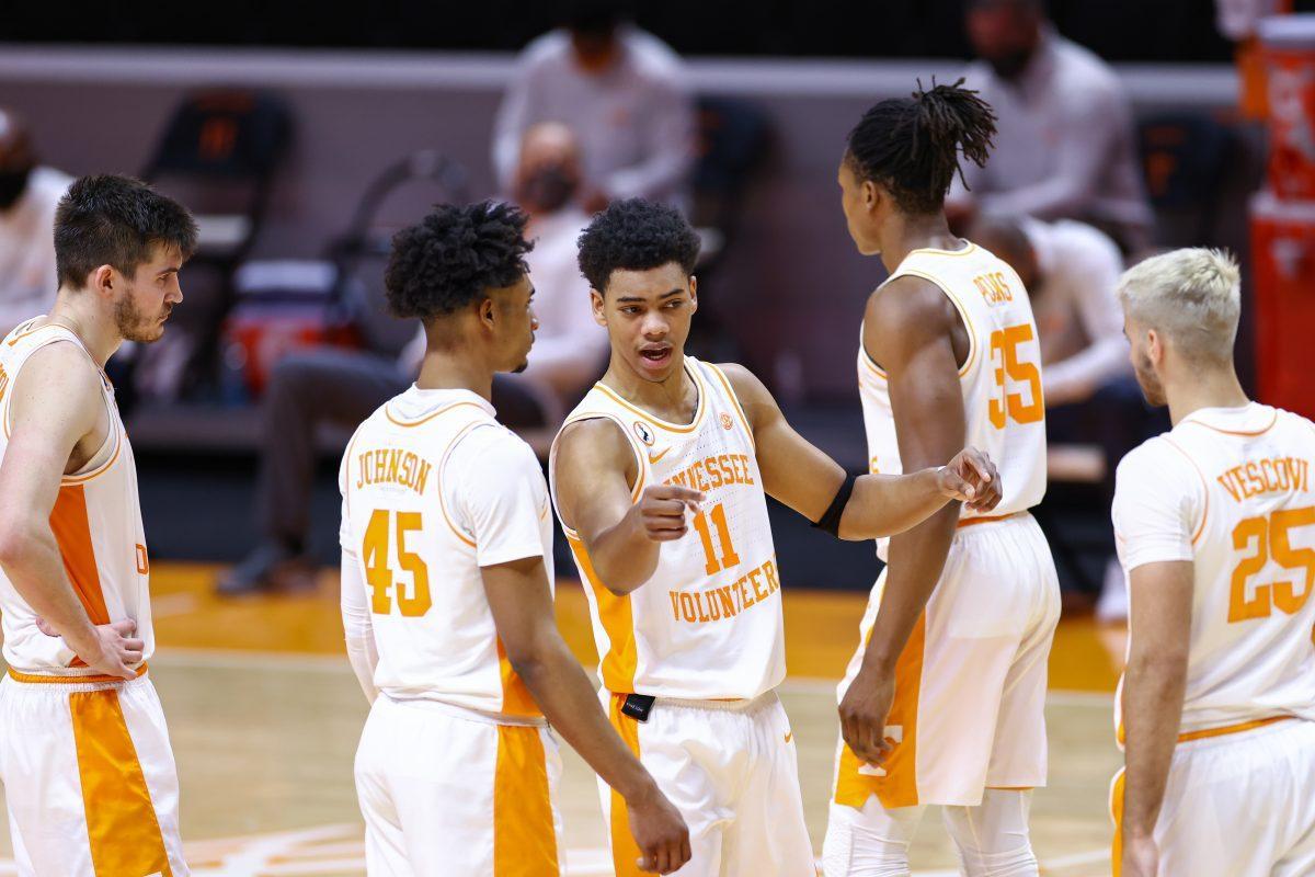 Dec 12, 2020; Knoxville, Tennessee, USA; Tennessee Volunteers forward John Fulkerson (10) and guard Keon Johnson (45) and guard Jaden Springer (11) and guard Yves Pons (35) and guard Santiago Vescovi (25) during the second half against the Cincinnati Bearcats at Thompson-Boling Arena. Mandatory Credit: Randy Sartin-USA TODAY Sports