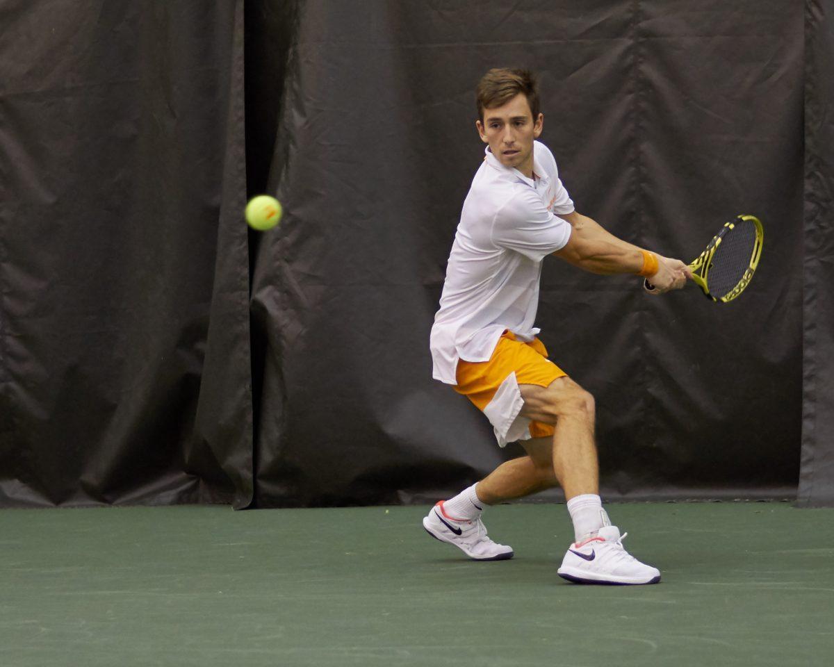 Luca Wiedenmann prepares to return a serve during the Men's Tennis opening game against New Mexico, in the Goodfriend Tennis Center on January 18, 2020.