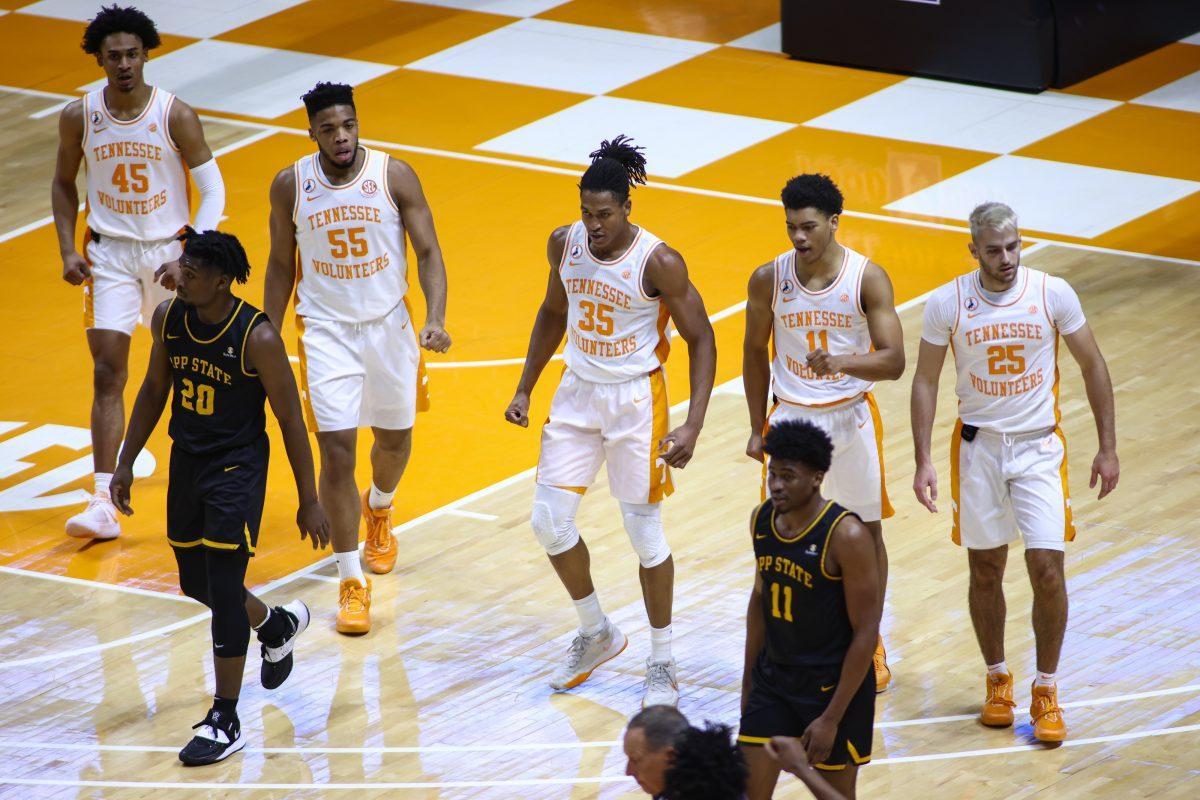 Dec 15, 2020; Knoxville, Tennessee, USA; Tennessee Volunteers guard Keon Johnson (45) and forward E.J. Anosike (55) and guard Yves Pons (35) and guard Jaden Springer (11) and guard Santiago Vescovi (25) during the first half against the Appalachian State Mountaineers at Thompson-Boling Arena. Mandatory Credit: Randy Sartin-USA TODAY Sports