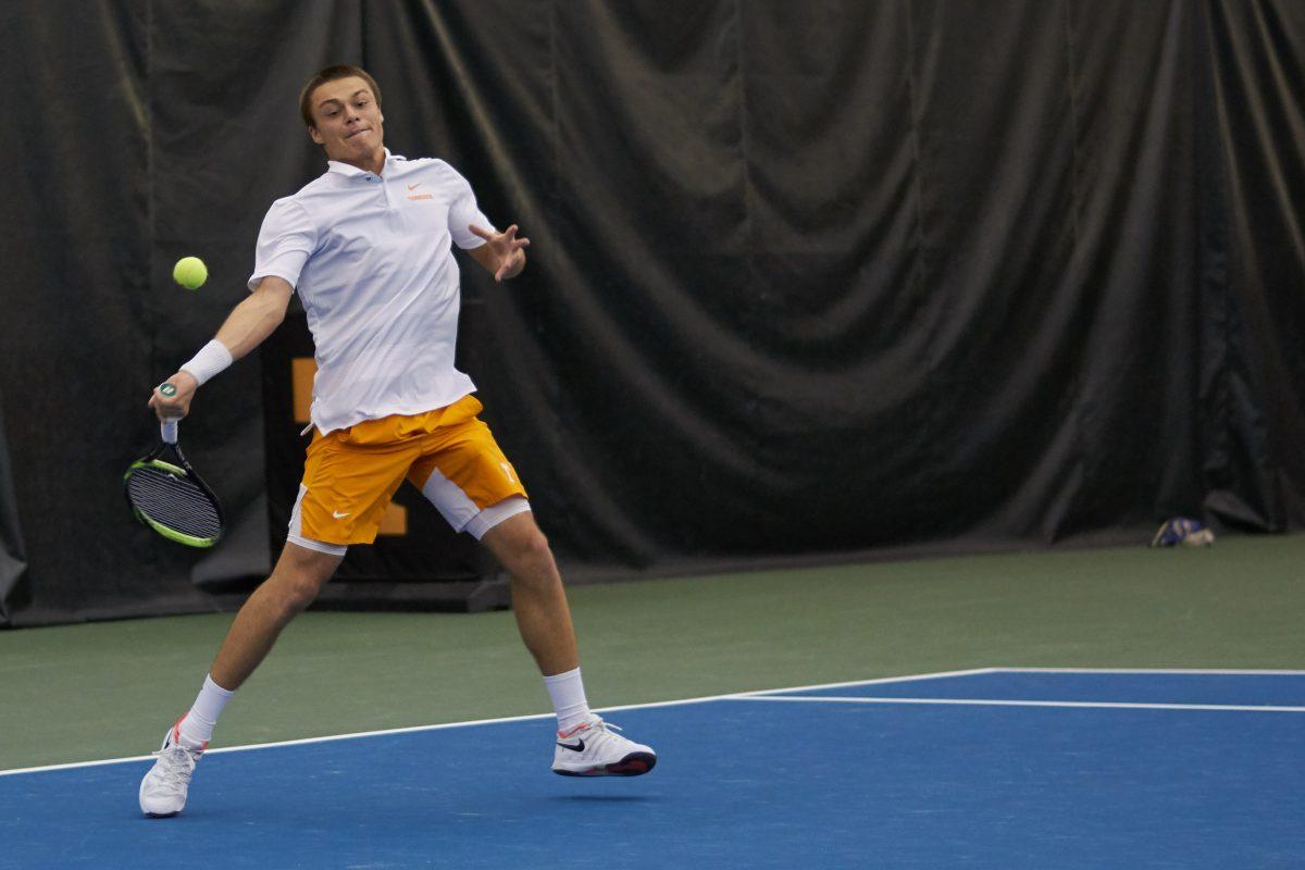 Martim Prata prepares to return a serve during the Men's Tennis opening game against New Mexico, in the Goodfriend Tennis Center on January 18, 2020.