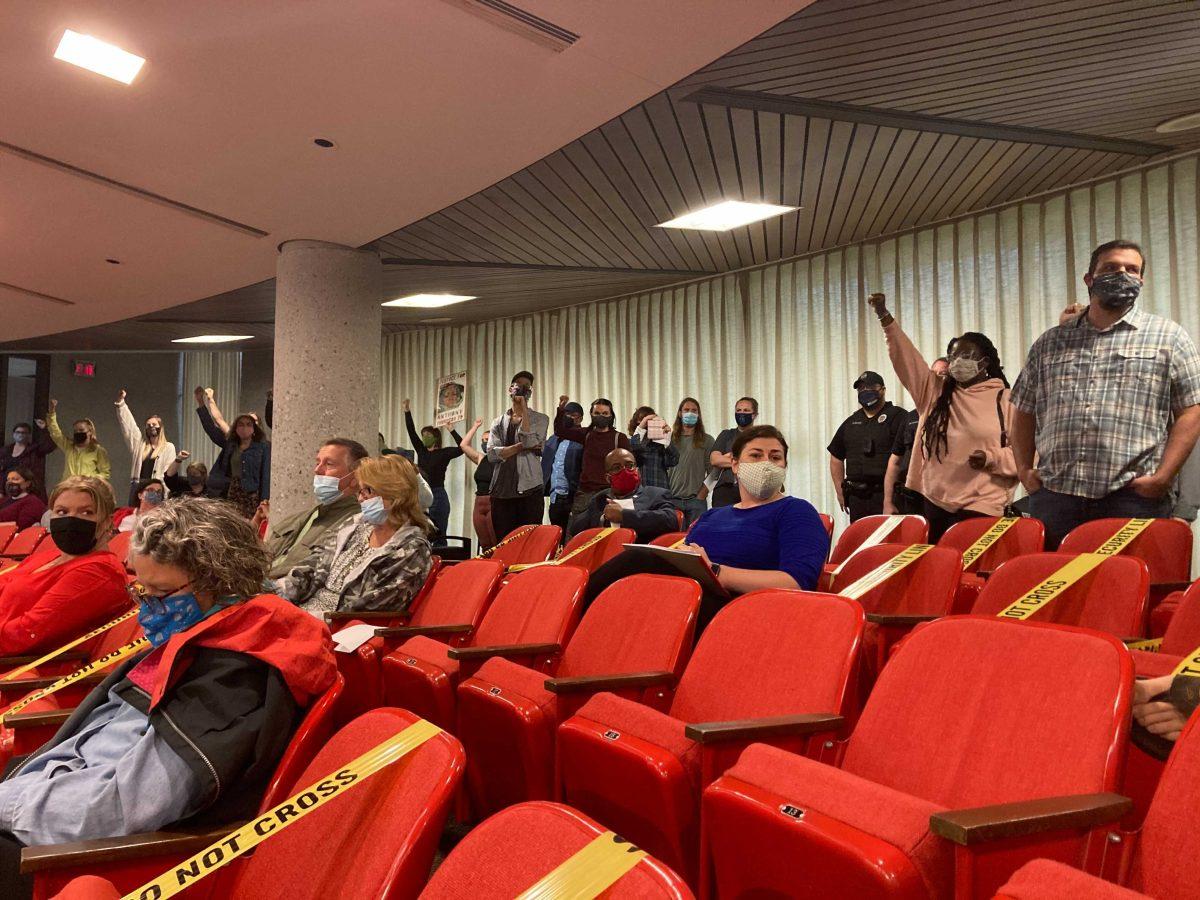 Protestors disrupt a City Council meeting on May 4 to demand the arrest of the officers involved in the shooting at Austin East Magnet High School