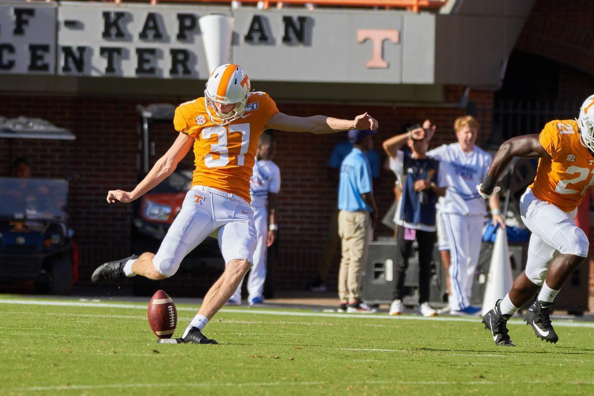 Paxton Brooks, #37, punts the ball during the Georgia State football game on August 31, 2019 in Neyland Stadium. 