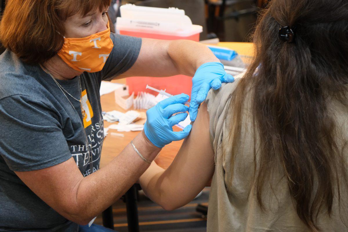 Student receives COVID-19 vaccine at the Neyland Stadium Vaccine Clinic on August 18, 2021.