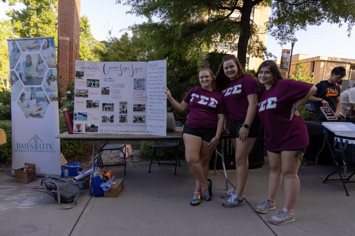 Members of the Gamma Sigma Sigma national service sorority post at the annual student engagement fair on Aug. 24, 2021.