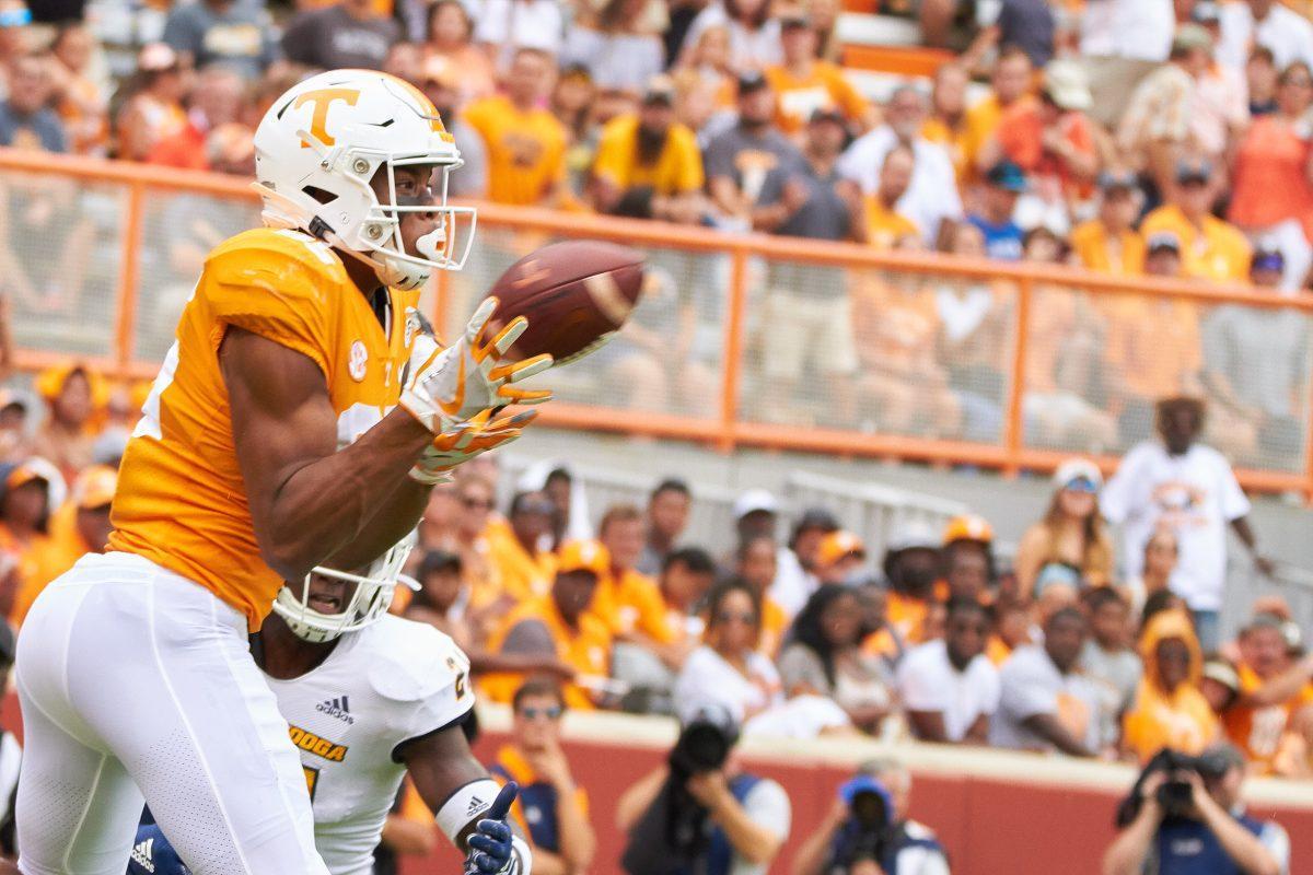 Cedric Tillman, #85, catches a wide pass in the end-zone for a touchdown at the Chattanooga football game. 