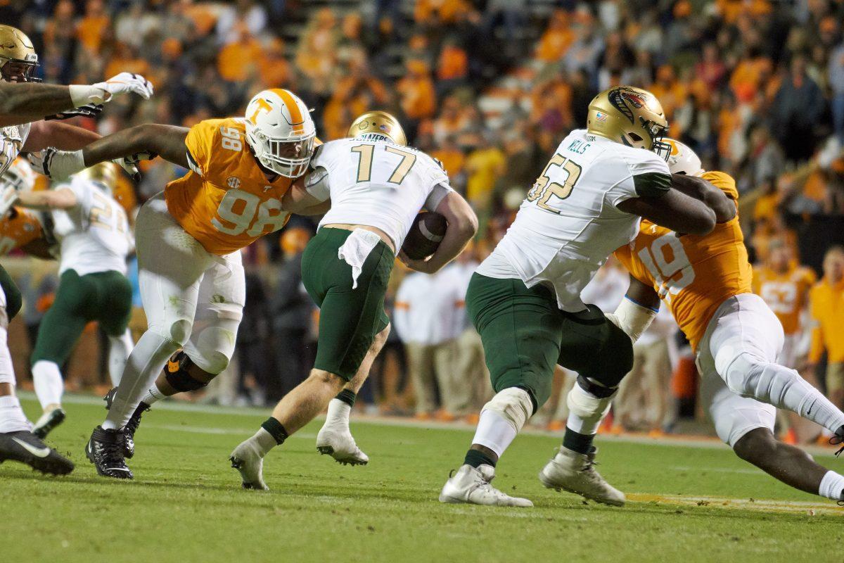 Aubrey Solomon, #98, tackles an opposing player at the UAB football game in Neyland Stadium on Saturday, November 2, 2019.