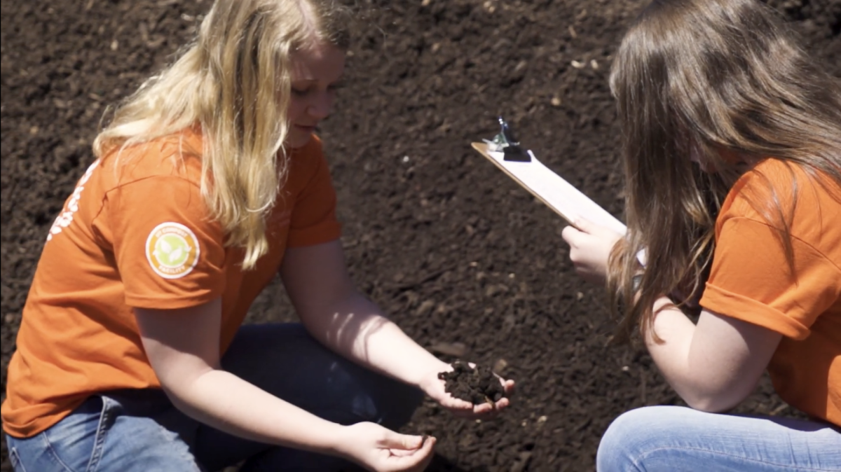 Rachel Stewart (left), president of the Compost Coalition, pictured in UT's Office of Sustainability "Growing Every Day at UT Compost Facility" official YouTube video. https://youtu.be/QoXki7-qjUw