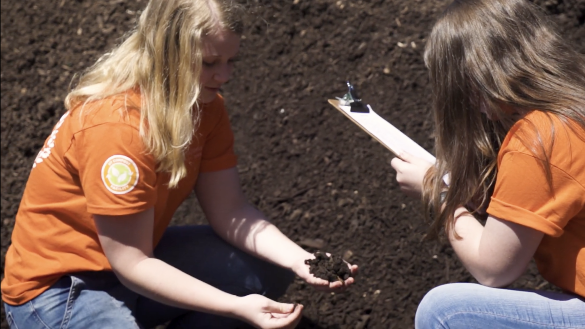 Rachel Stewart (left), president of the Compost Coalition, pictured in UT's Office of Sustainability "Growing Every Day at UT Compost Facility" official YouTube video. https://youtu.be/QoXki7-qjUw