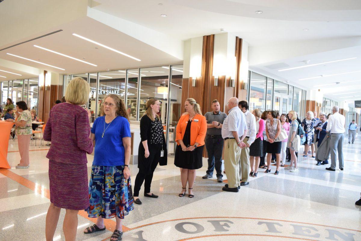 Chancellor Plowman speaks with staff and faculty following her welcome reception on Aug. 21, 2019.