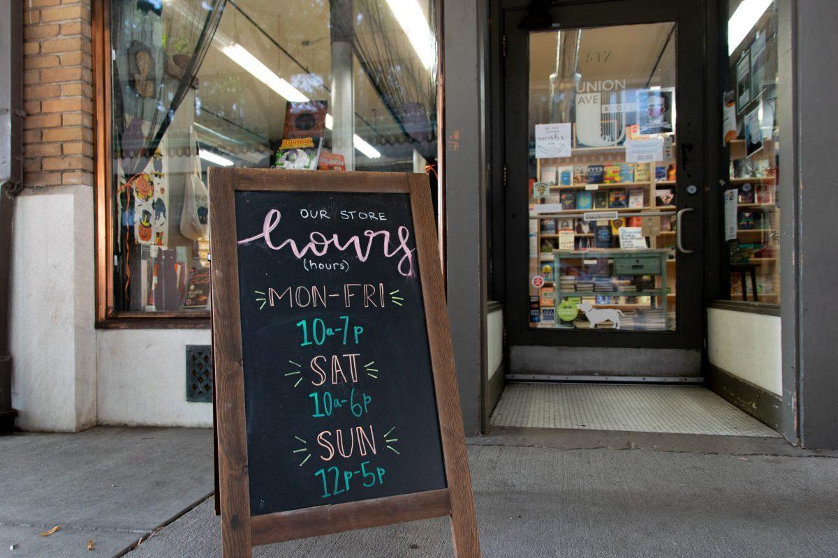 Union Ave Book's hours of operation in downtown Knoxville, near Market Square. Thursday Oct. 21, 2021.