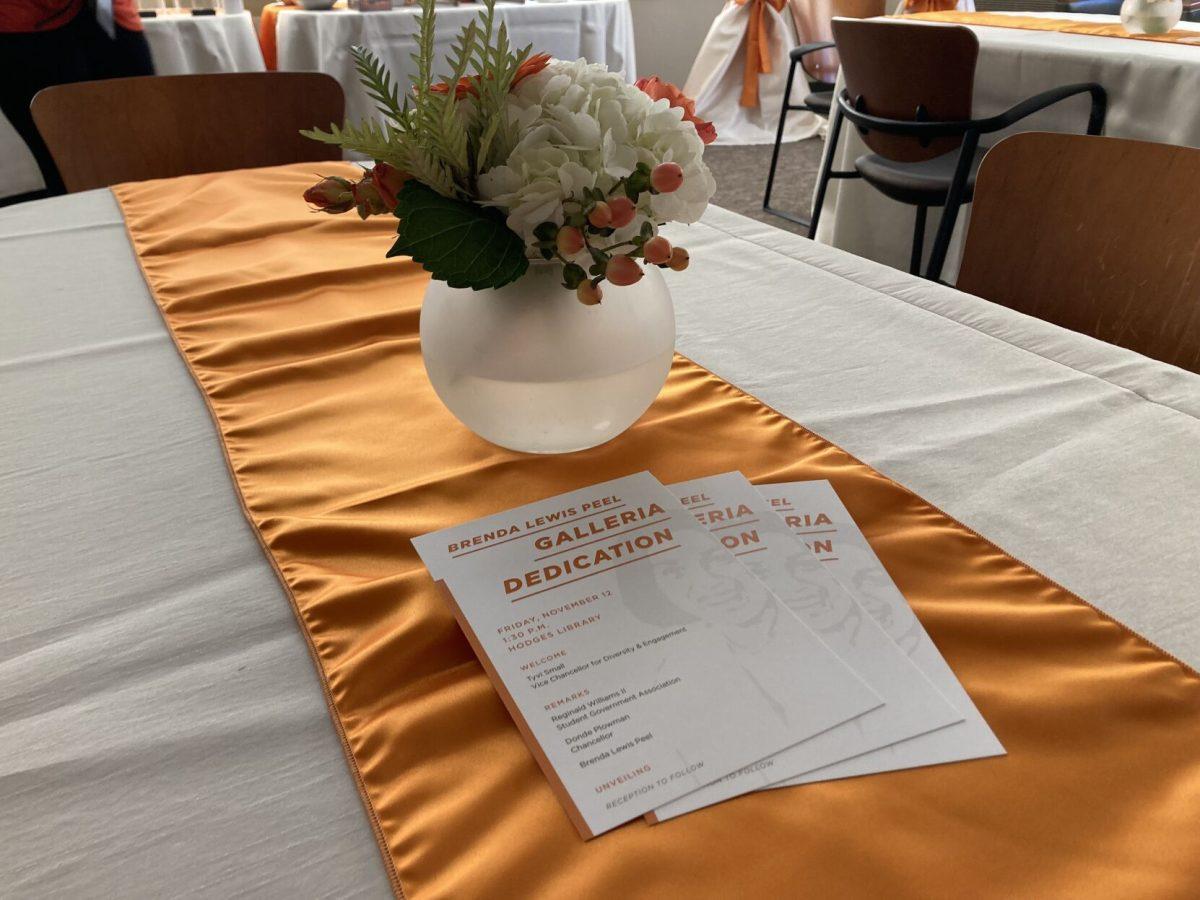 A table is decorated for the dedication ceremony of the newly named Brenda Lewis Peel Galleria in Hodges Library, named for the first Black graduate of UT. 