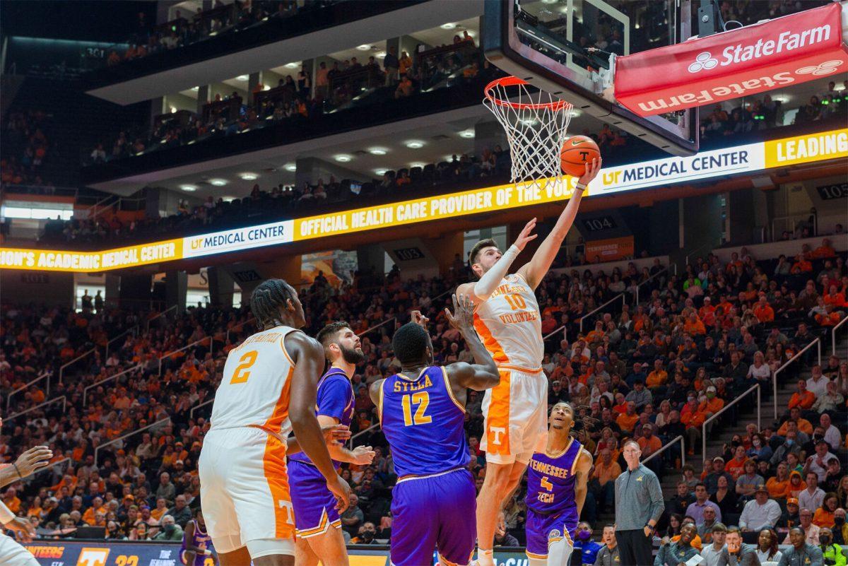 John Fulkerson (10) with a layup against Tennessee Tech at Thompson Boling Arena on Nov. 26, 2021.