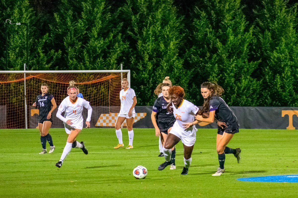 Lady Vol Cariel Ellis (26) fighting off a Lipscomb defender at Regal Stadium in Knoxville, Tenn. Friday, November 12, 2021.