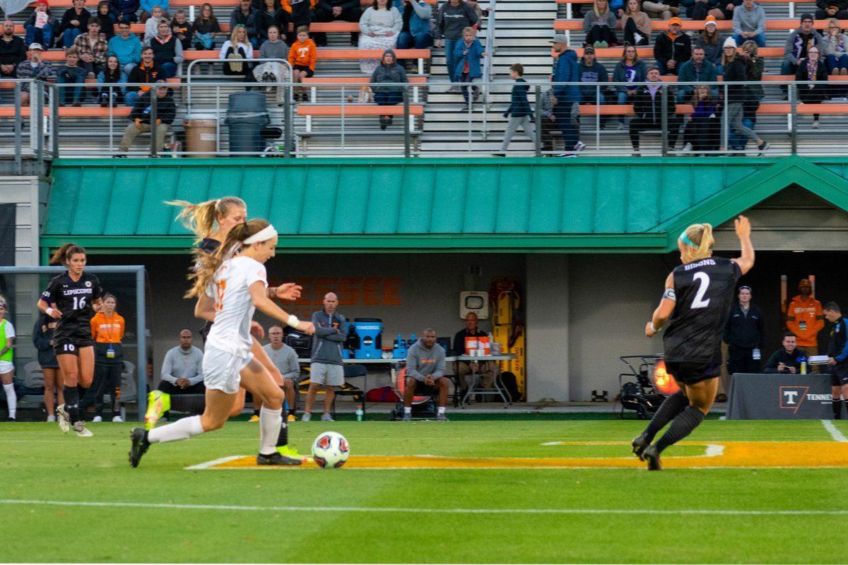 Jordan Fusco (11) taking on two Lipscomb defenders at Regal Stadium in Knoxville, Tenn. Friday, November 12, 2021.