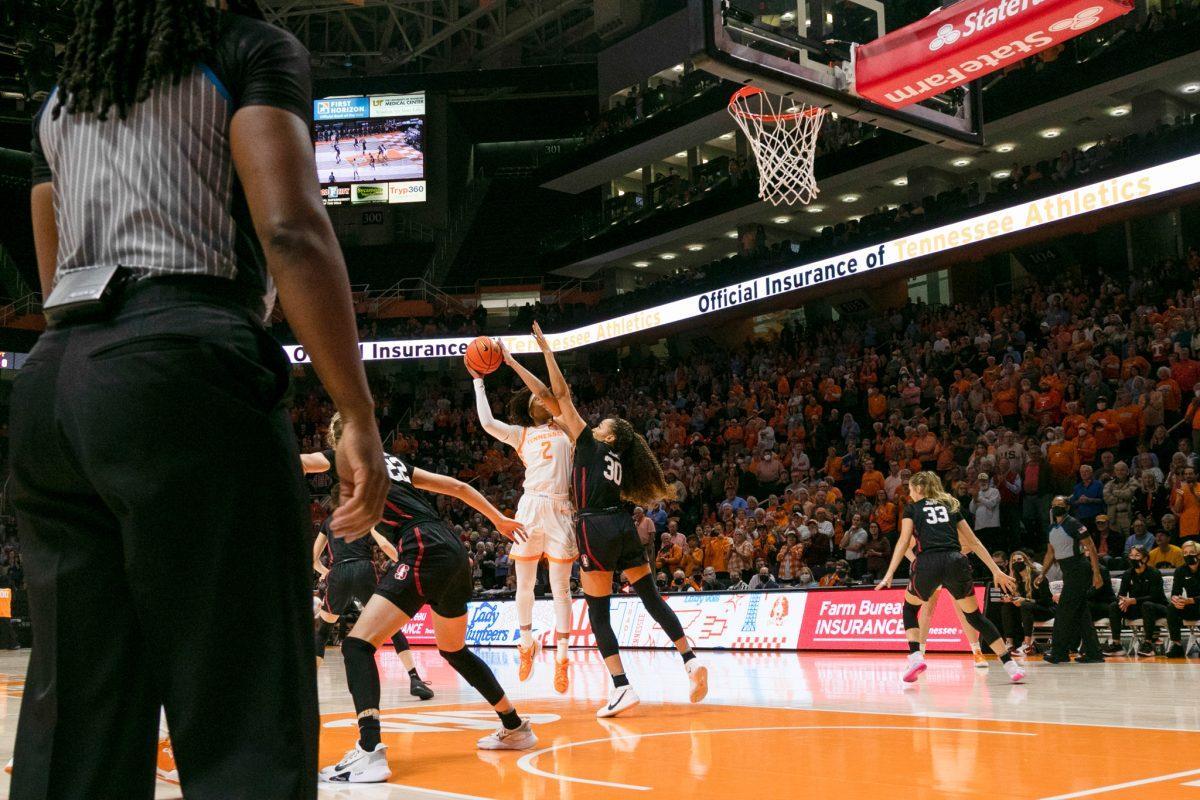 Alexus Dye (2) takes a shot over Stanford's Haley Jones (30) at Thompson Boling Arena on Saturday December 18, 2021.