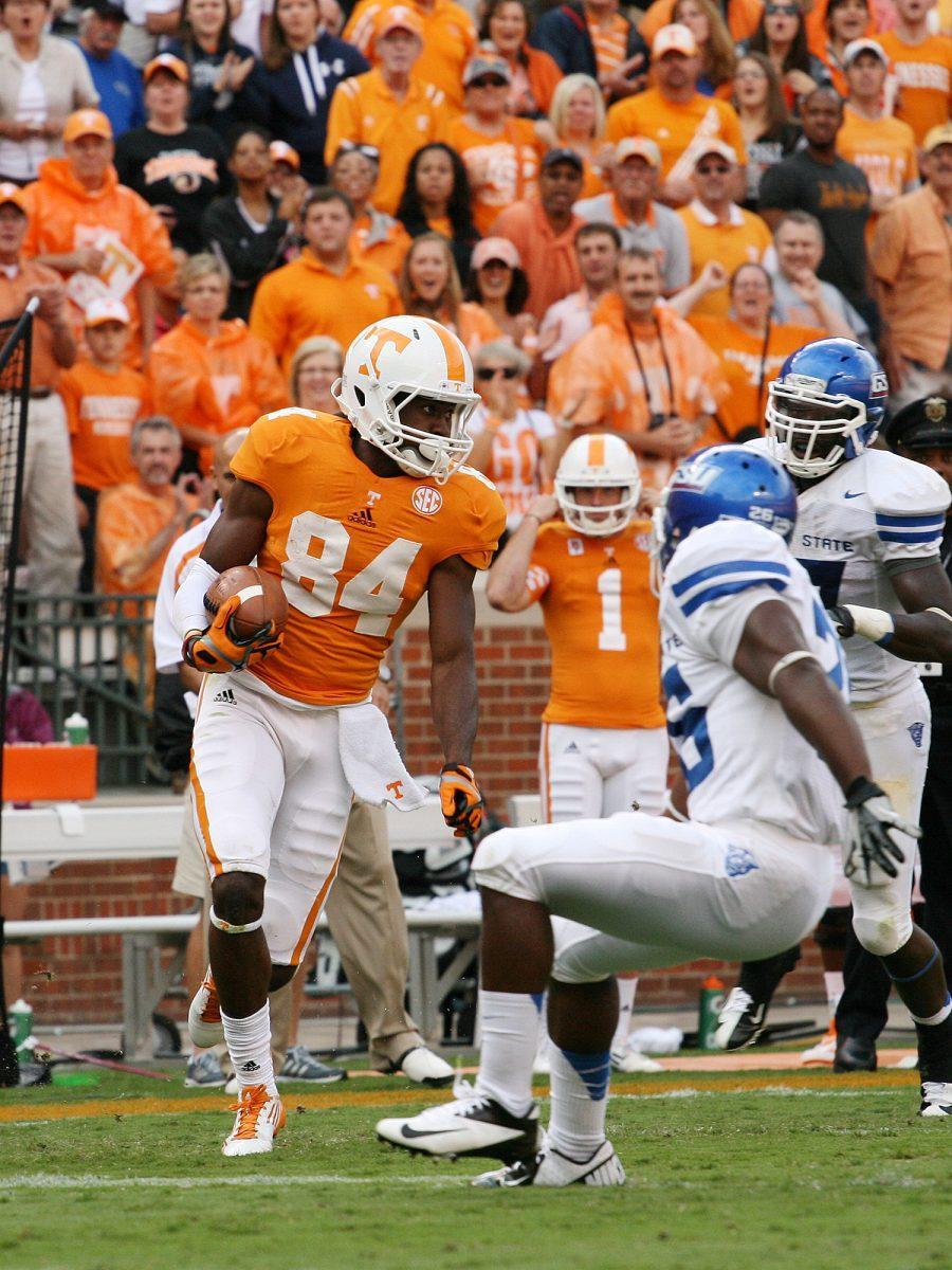 Wide receiver Cordarrelle Patterson dodges Georgia State defenders on Sept. 8.