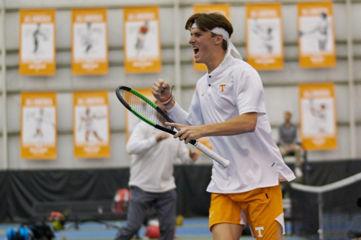 Pat Harper celebrates after scoring during the Men's Tennis opening game against New Mexico, in the Goodfriend Tennis Center on January 18, 2020.