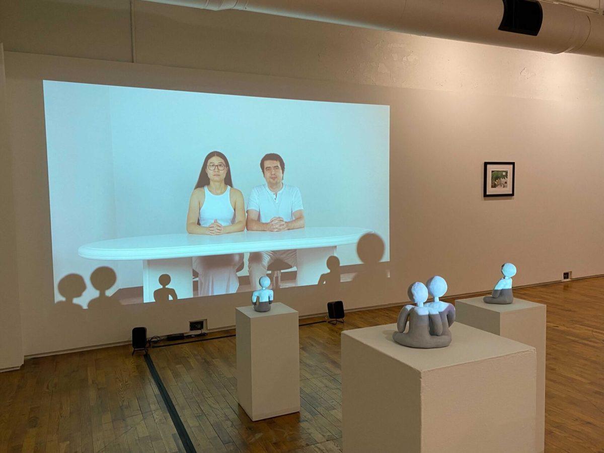 In her art installation "Let's Make a Baby!" 2nd-year MFA student Danqi Cai displayed a video of her and her husband creating and caring for clay children, representatives of the children they have decided not to have. 