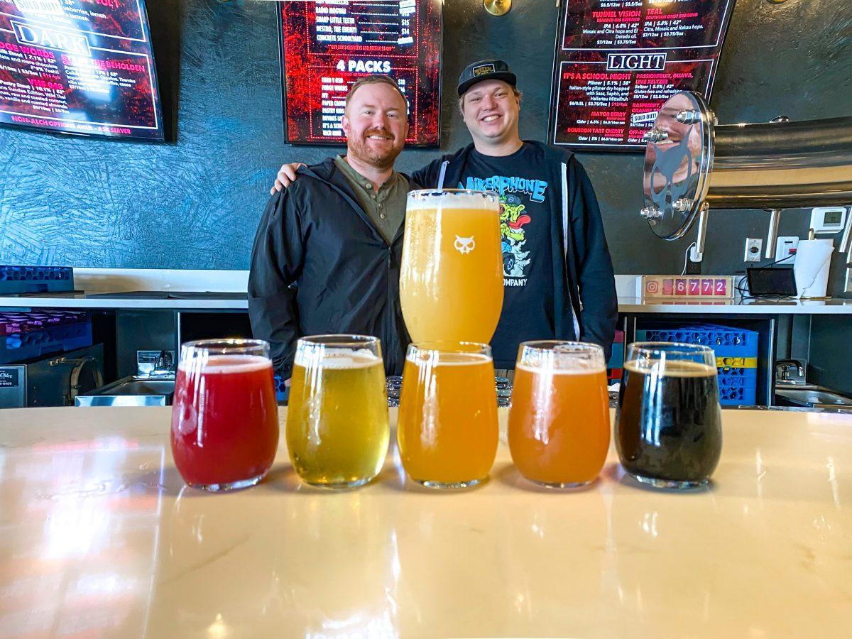 Brad West (left) and Bentley Blackshear (right) present a variety of selections at Xul Beer on Friday Mar. 18, 2022.