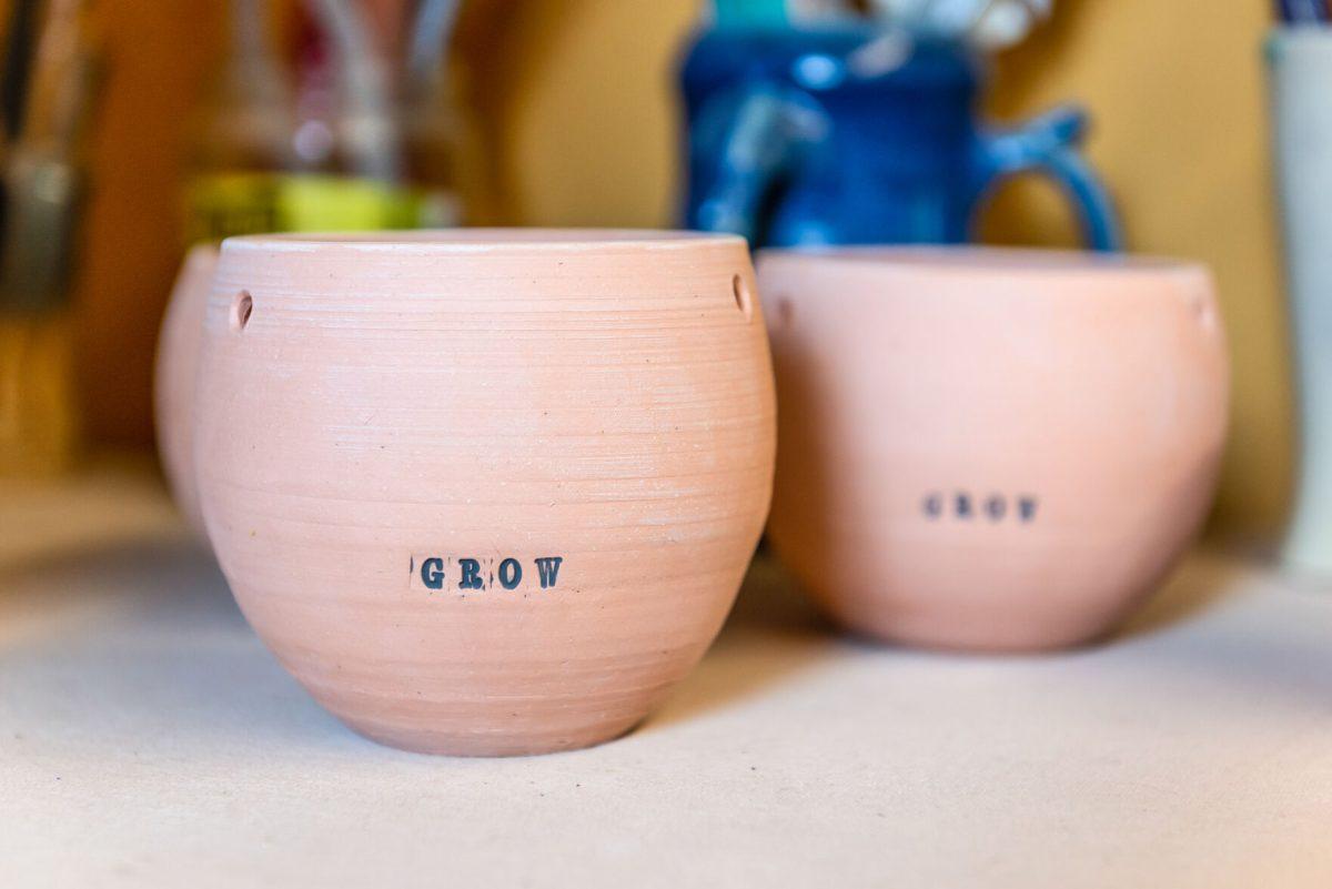 Hanging pots by local clay artist Stacy Shepanek in her studio at Mighty Mud in Knoxville, TN. Tuesday, Mar 8, 2022.