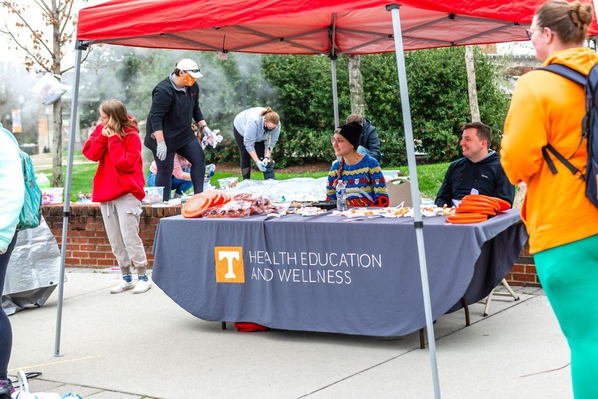 Booths at the Fresh Check Day on Pedestrian Walkway offer information and resources about mental health and suicide prevention. Wednesday Mar 9, 2022.
