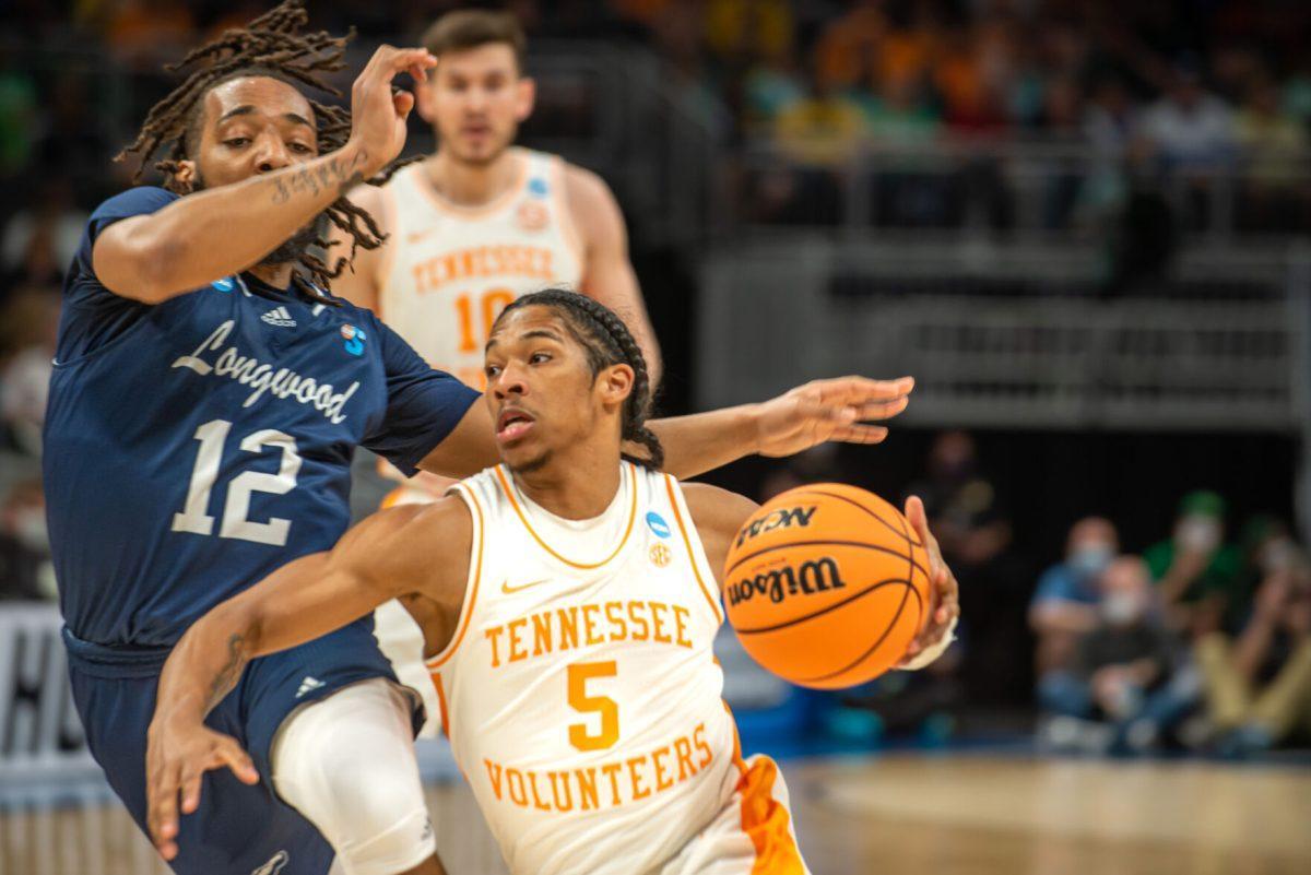 Zakai Zeigler, no. 5, drives past the Longwood defense during the first round of the NCAA tournament in Indianapolis, IN on Thursday Mar. 17, 2022.