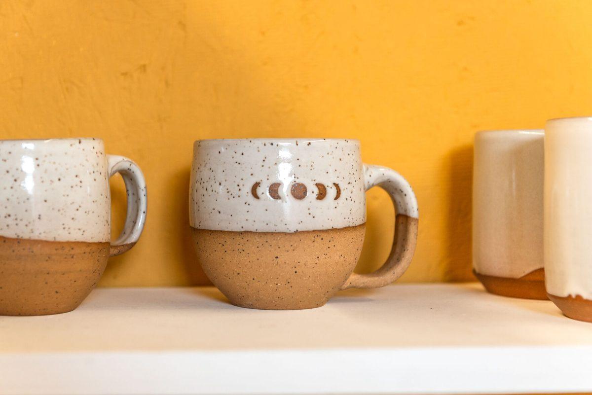 A mug by local clay artist Stacy Shepanek in her studio at Mighty Mud in Knoxville, TN. Tuesday, Mar 8, 2022.