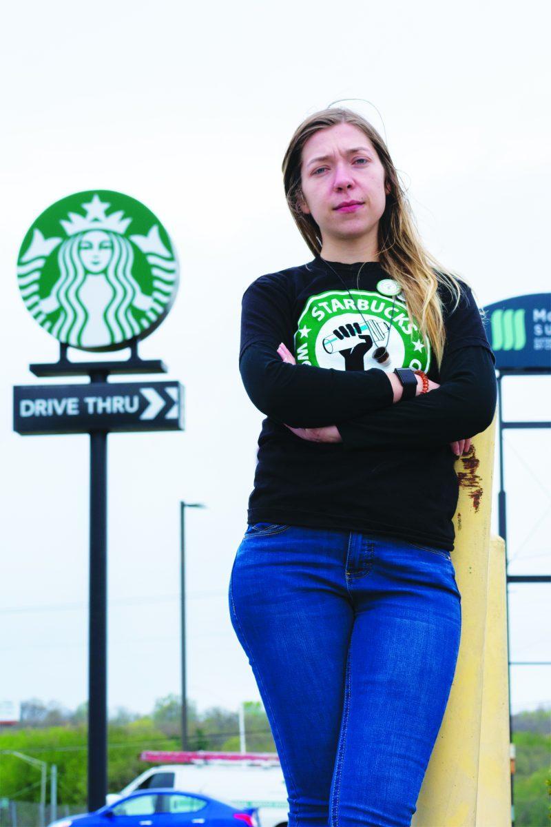 Maggie Carter, a UT journalism student who led the union charge at the Merchants Drive Starbucks, stands in front of the establishment on April 8, 2022.