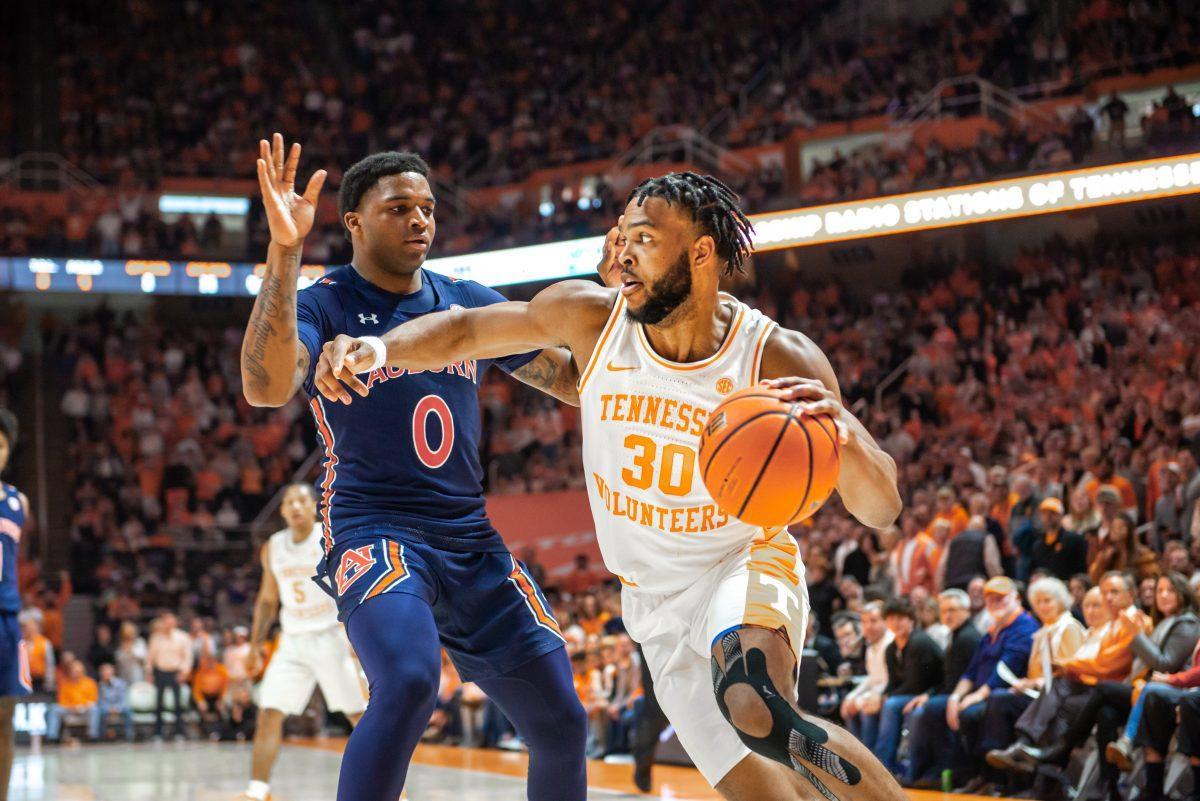 Josiah-Jordan James, No.30, driving offense in the first half of the Tennessee v Auburn game in Thompson Boling Arena on Saturday Feb. 26, 2022.