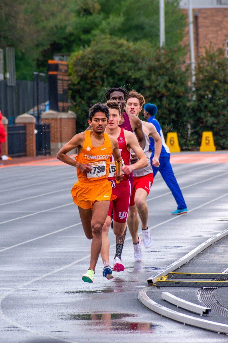 Tennessee's Fuji Anday tries to hold off the competition during the men's 4x1500 meter relay at Tom Black track. Saturday Apr. 9, 2022.