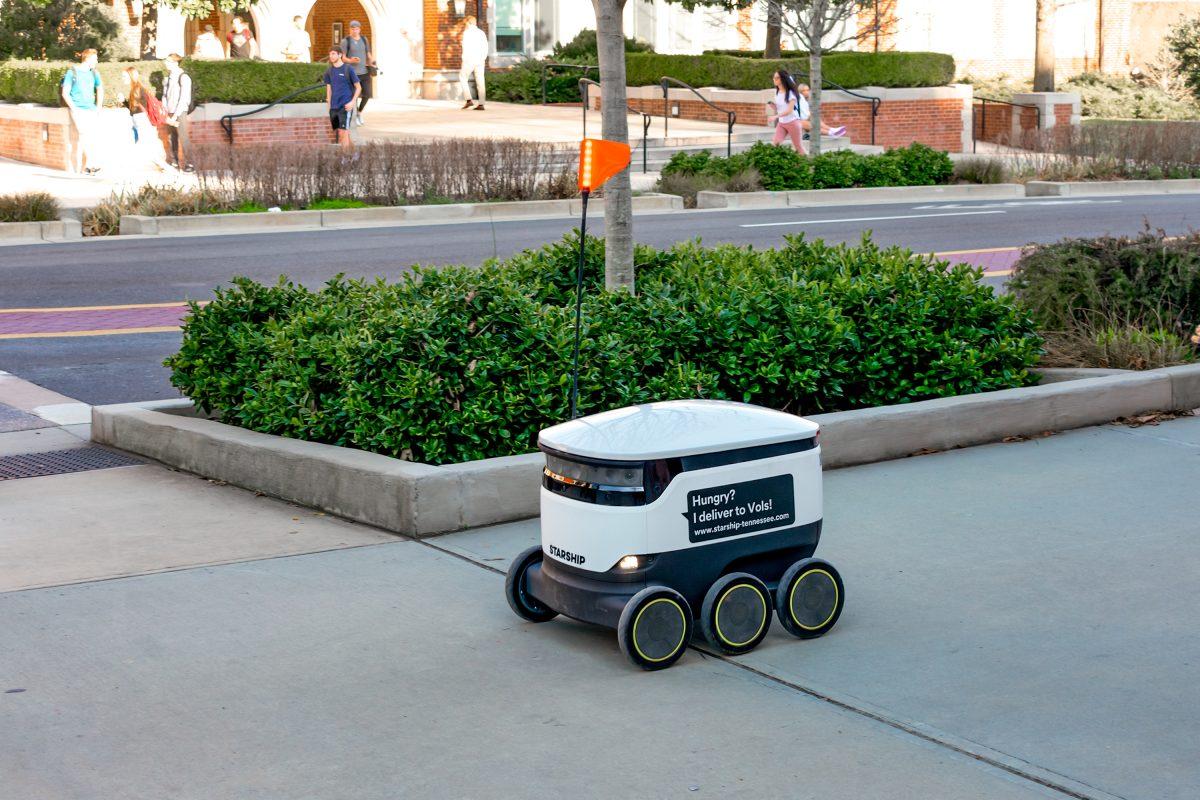 Starship Technologies launched its food delivery robot innovation on UT campus, allowing the robots to deliver food and packages to students across campus. The pictured robot is on route in front of the Haslam Business Building on Thursday Mar. 3, 2022.