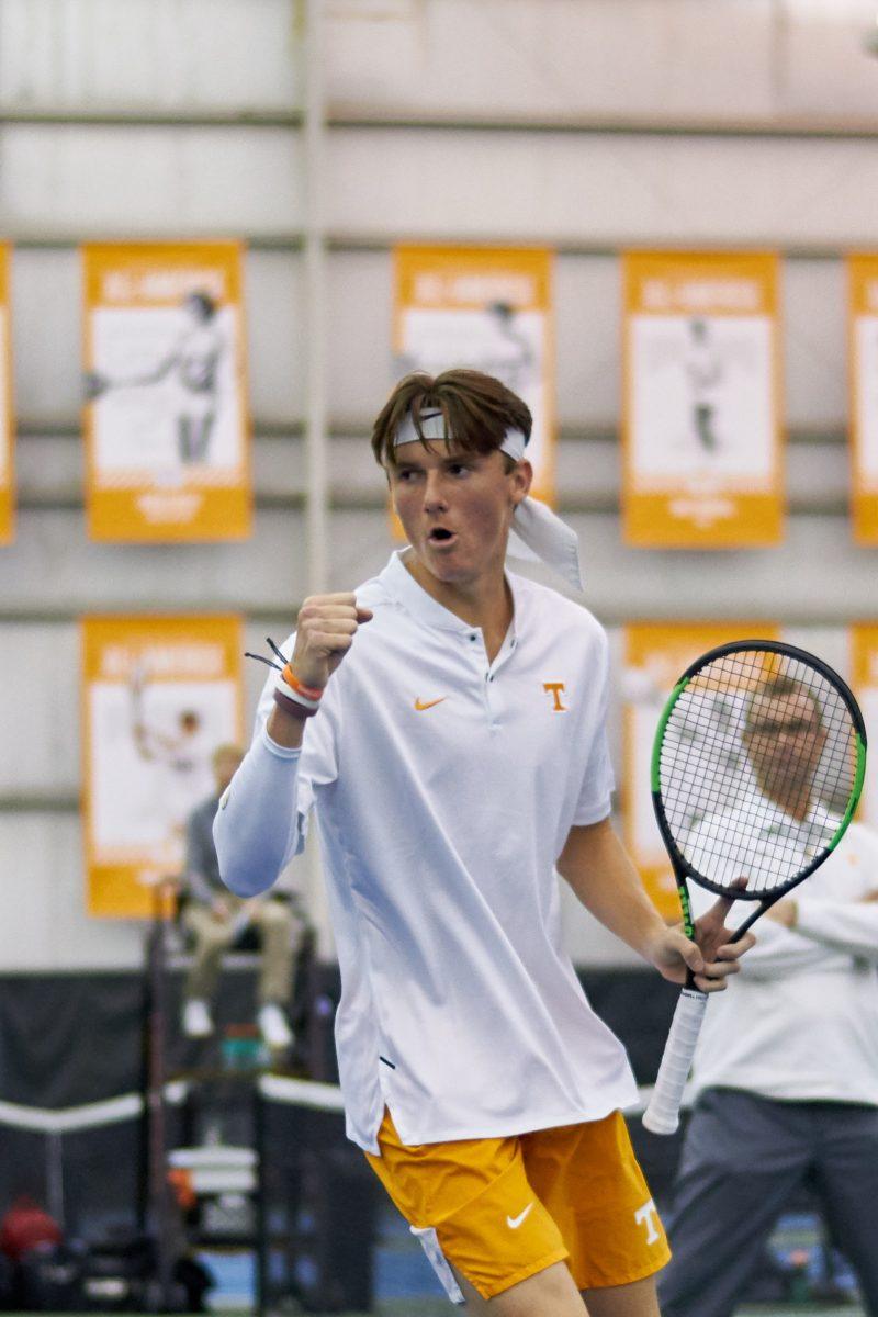 Pat Harper celebrates after scoring during the Men's Tennis opening game against New Mexico, in the Goodfriend Tennis Center on January 18, 2020.