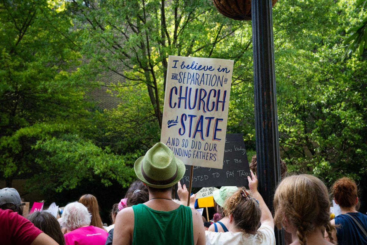 A crowd gathered at Krutch Park and poured into Gay Street to protest the overturning of Roe v. Wade on Friday, June 24, 2022.  