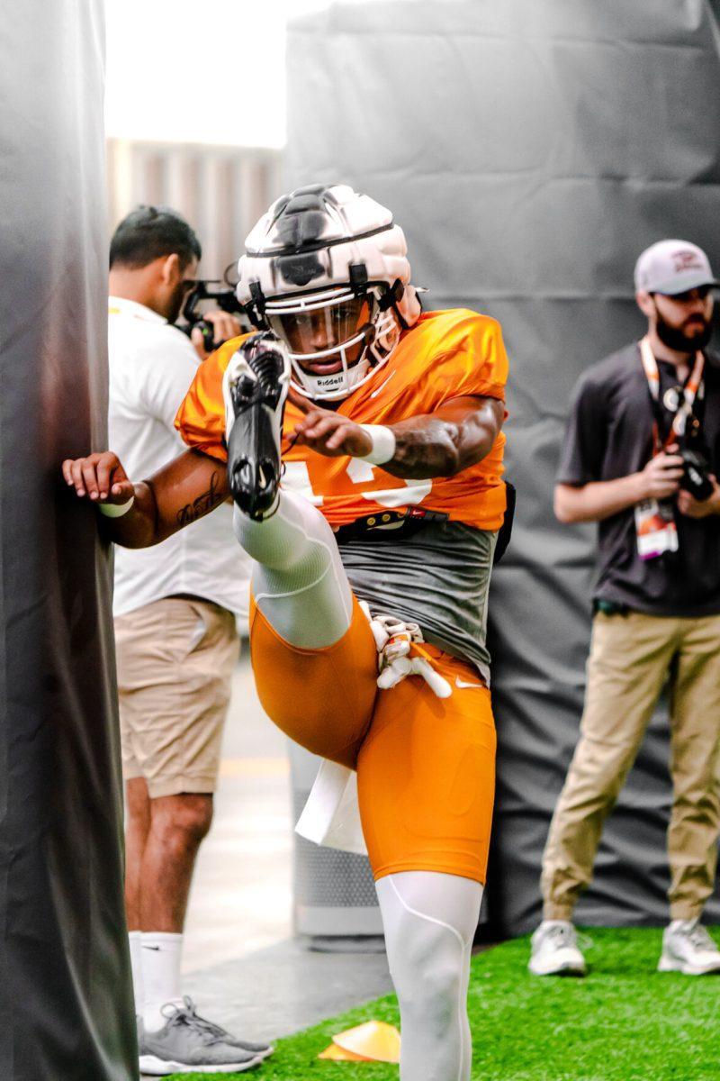 Defensive back Wesley Walker warms up before Tennessee's practice on Monday, Aug. 8, 2022.
 