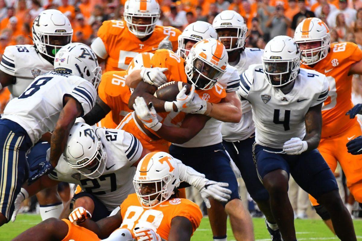 KNOXVILLE, TN - No. 20 Jaylen Wright tackled during a run with the ball against Akron in Neyland Stadium on Saturday Sep. 17, 2022.